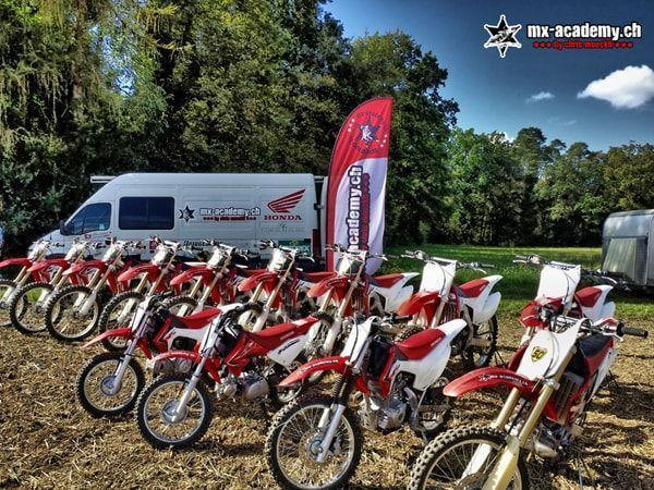 Motocross photos: Honda bikes for big and small riders lined up in front of the MX-Academy van